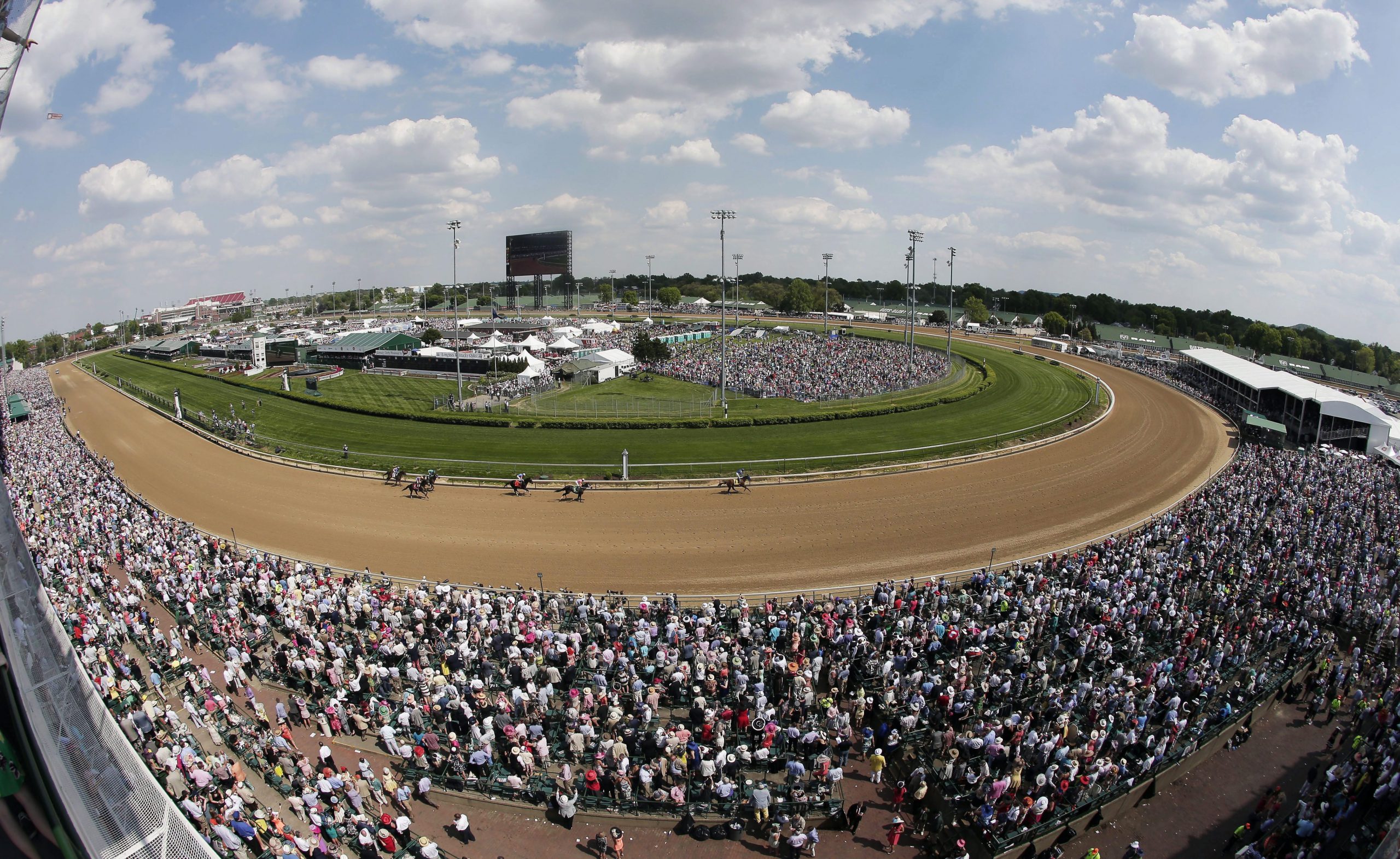 Photo of the 141st running of the Kentucky Derby horse race at Churchill Downs. Photo by Charlie Riedel, /AP