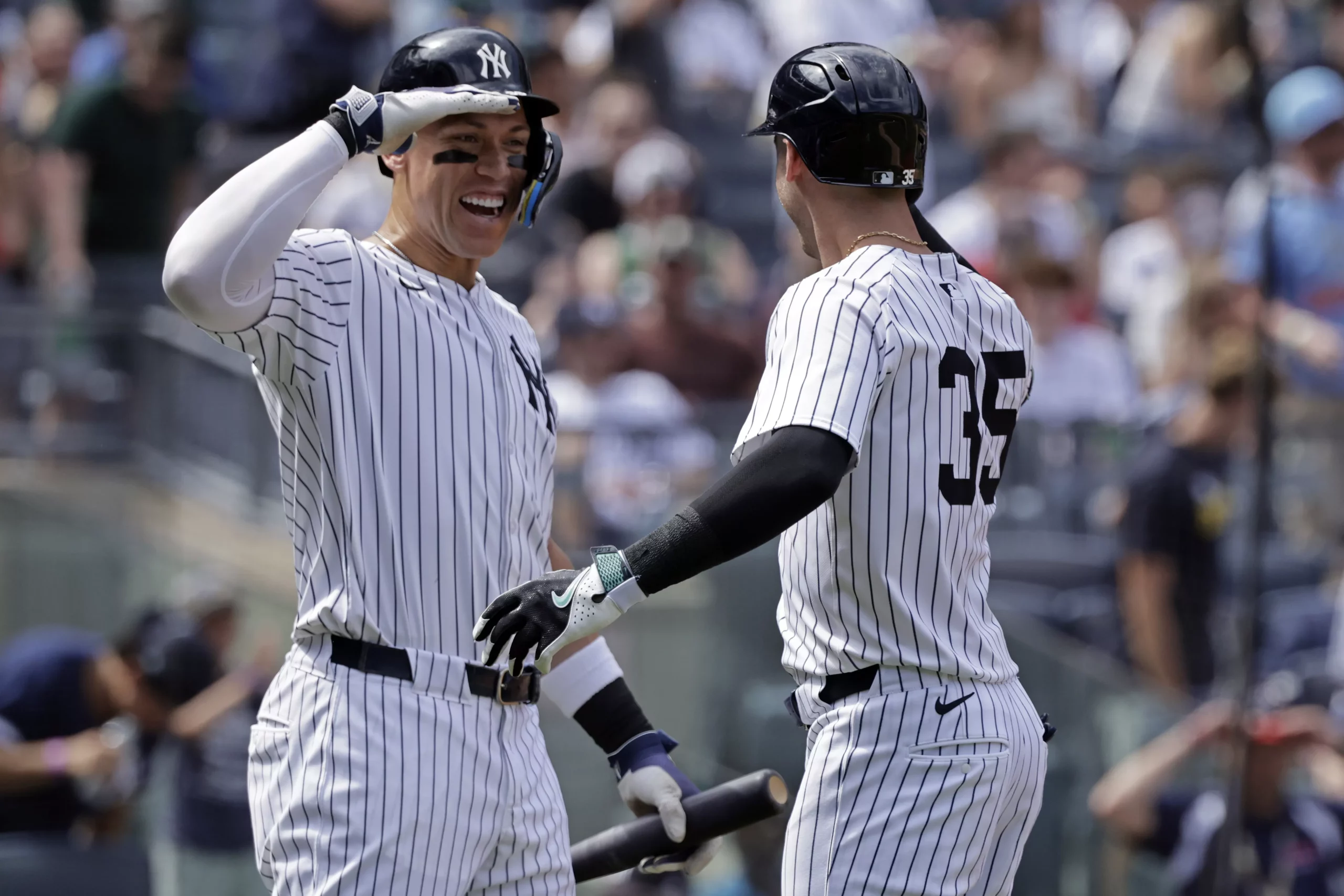 Judge leads MLB in batting average and total bases per game. Photo by Adam Hunger/AP.