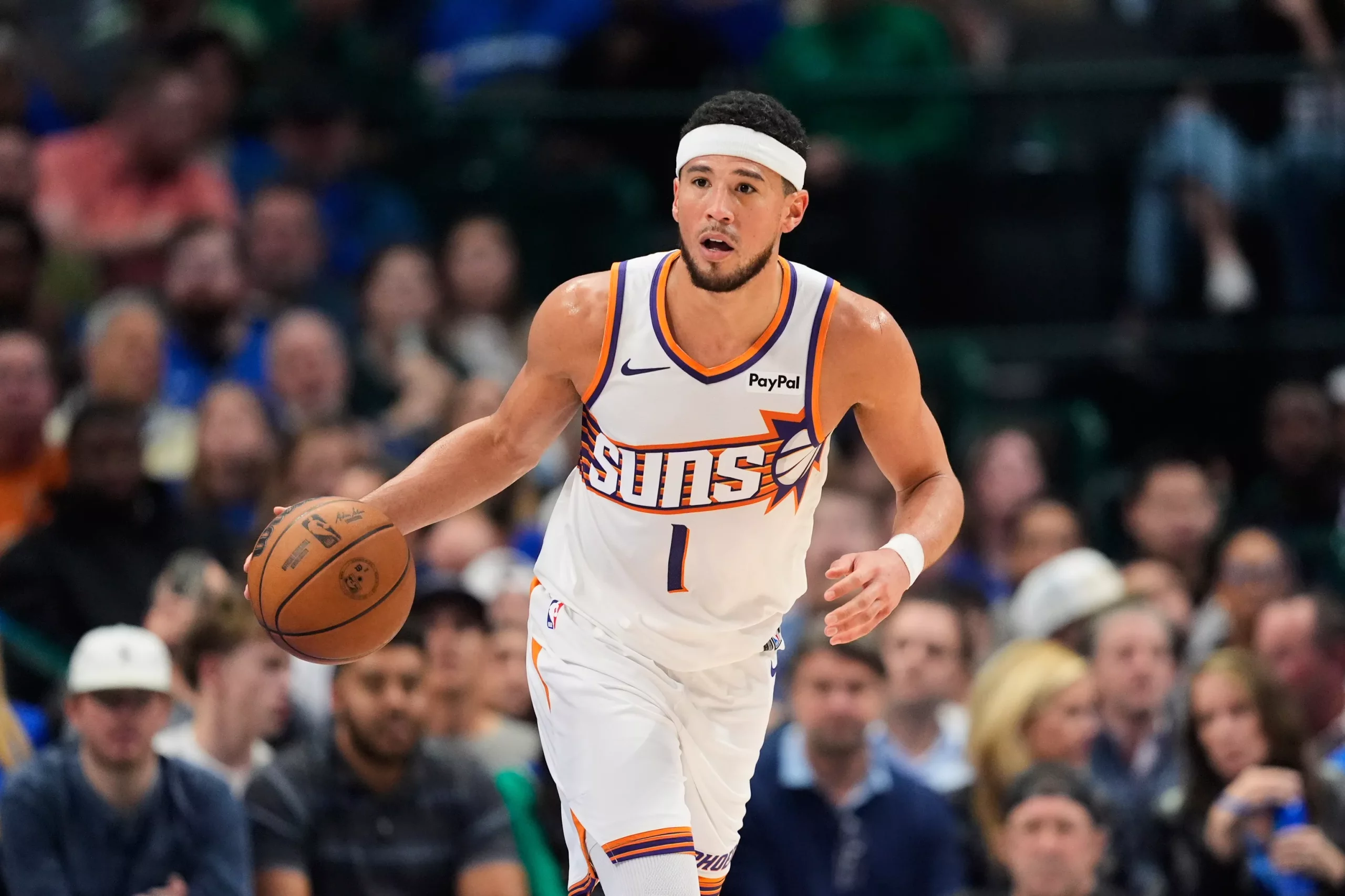 Check out this +310 SGP ft. Devin Booker. Photo by Tony Gutierrez/AP.